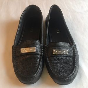EUC Coach Slip ons.